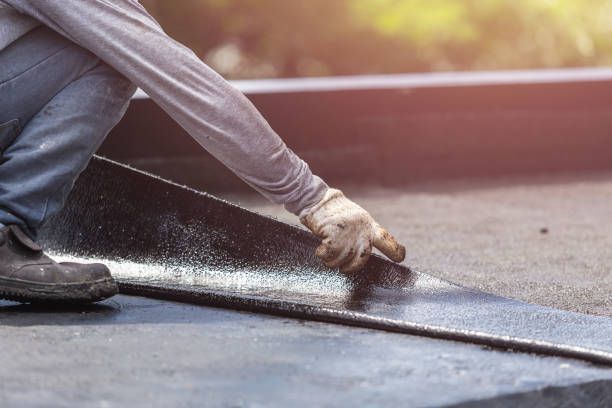 Professional Basement Waterproofing technician working in Georgetown, IN